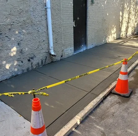 Cured and sealed result of a driveway repair & resurfacing job, Seattle