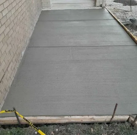 Saw-cut detail on a stamped concrete repair job in Seattle, WA